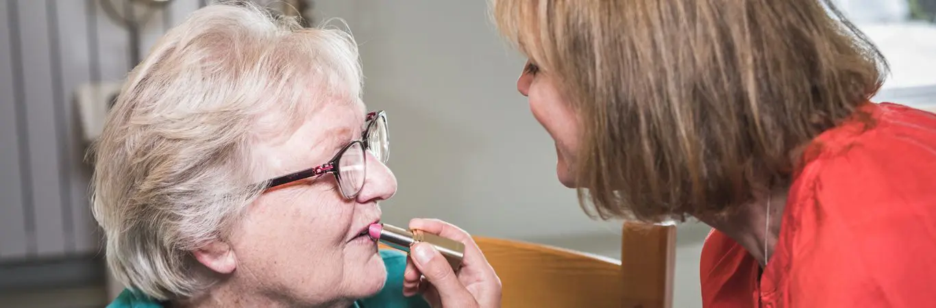 dementia care_carer doing a patients makeup