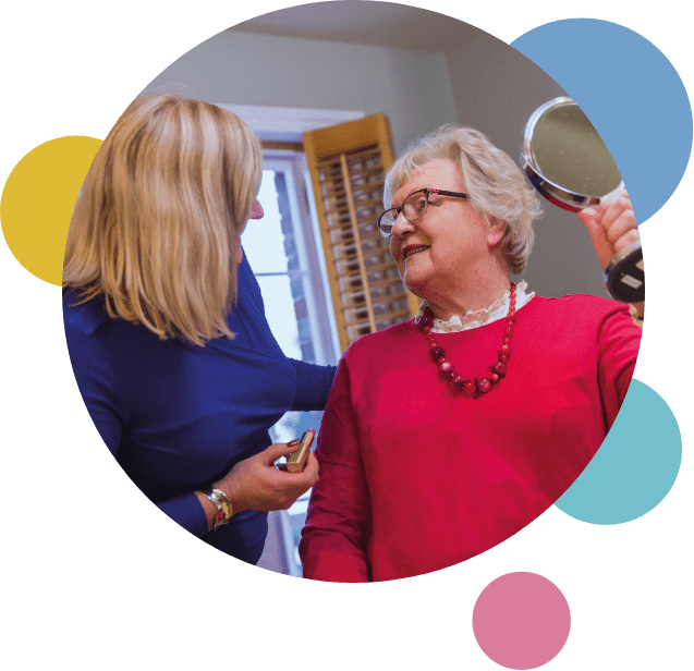 live-in-care_services_carer helping patient with their makeup