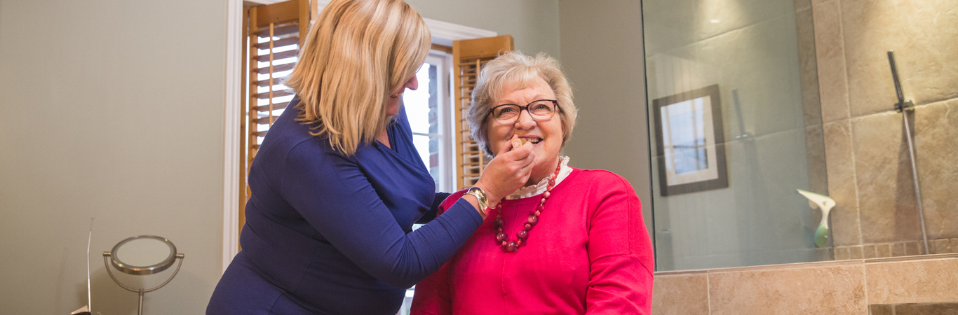 looking after the elderly_carer doing a patients makeup