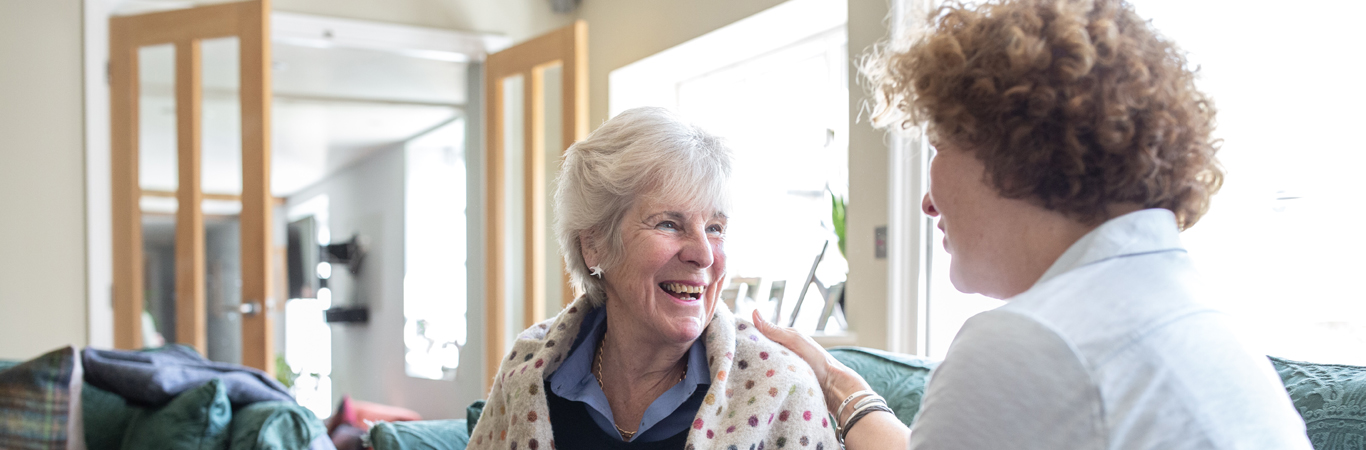 stroke recovery_patient laughing with carer