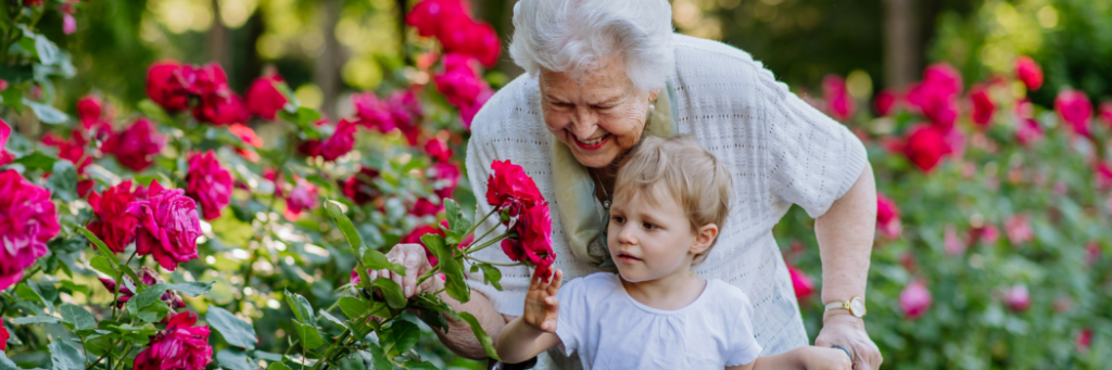 Client and granddaughter taking a walk in the garden